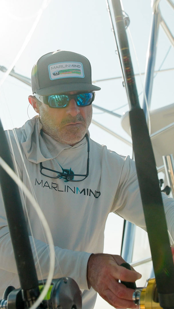 Front view of Marlin Mind hooded performance shirt worn while fishing